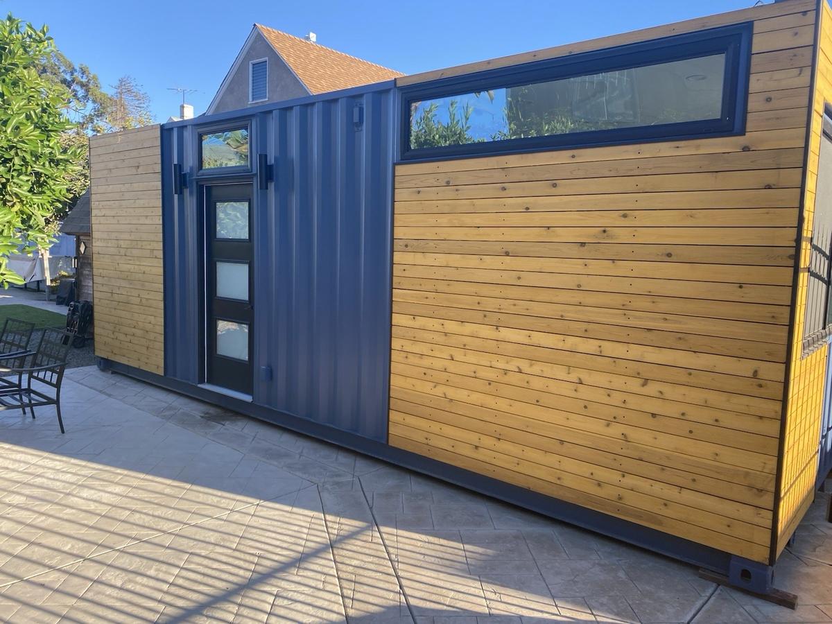 Corten Steel vs. Traditional Wood Framing: Why Upcycled Shipping Containers Outlast Conventional Tiny Houses